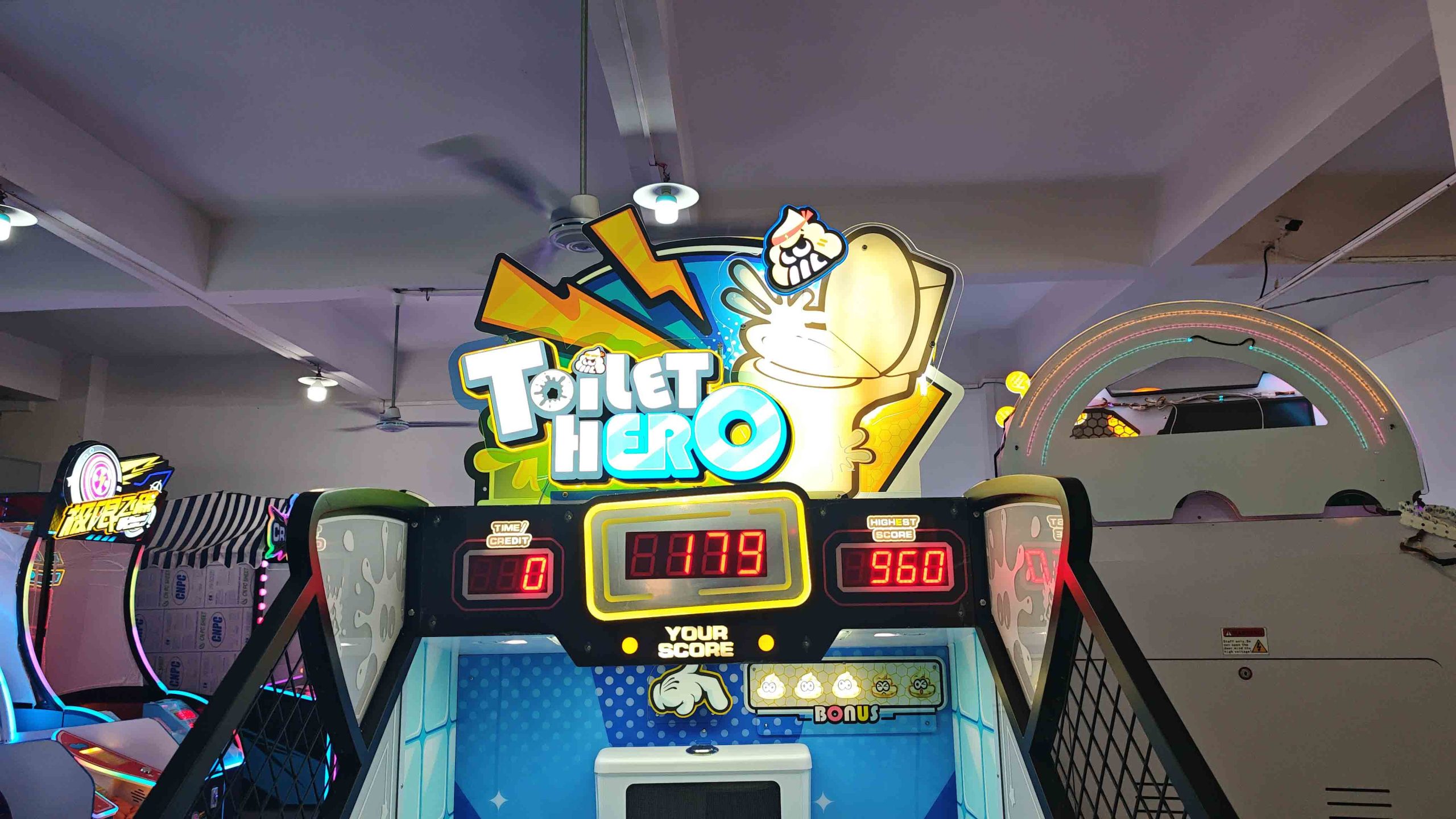 toilet tossing ticket game scaled